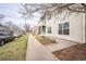 Street view of a multi-story home with a manicured lawn and a well-maintained sidewalk at 2809 Syracuse Ct # 129, Denver, CO 80238