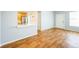 Bright living room with hardwood floors, open to kitchen, offering a spacious and modern living experience at 2809 Syracuse Ct # 129, Denver, CO 80238