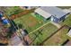 Aerial view of the home and spacious backyard with covered patio at 2205 S Irving St, Denver, CO 80219