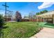 Well-maintained backyard features a covered patio and storage shed at 2205 S Irving St, Denver, CO 80219