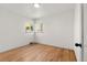 Bright bedroom with hardwood floors and natural light from windows at 2205 S Irving St, Denver, CO 80219