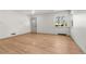 Spacious living room features gleaming hardwood floors and a large window at 2205 S Irving St, Denver, CO 80219