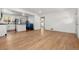 Bright living room boasts gleaming hardwood floors, fresh paint, and open layout at 2205 S Irving St, Denver, CO 80219