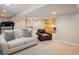 Finished basement featuring a comfortable seating area, wet bar, and exercise area at 1009 Monarch Way, Superior, CO 80027
