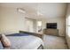Spacious bedroom with vaulted ceiling, ceiling fan, neutral tones, and a walk-in closet at 1009 Monarch Way, Superior, CO 80027