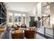 Bright foyer with high ceilings, modern lighting, and comfortable seating, creating a welcoming entrance at 1009 Monarch Way, Superior, CO 80027