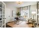 Comfortable office featuring a modern desk, chair, natural light, and sitting area at 1009 Monarch Way, Superior, CO 80027
