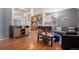 Open concept with living room, dining area and view into the kitchen at 1910 S King St, Denver, CO 80219
