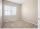 Neutral bedroom with plush carpet and window for natural light at 8467 Canyon Rim Cir # 302, Englewood, CO 80112