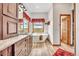Bathroom with wood cabinets, soaking tub, and gorgeous views at 15125 Spring Valley Rd, Larkspur, CO 80118