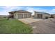 Long driveway leading to the garages, offering plentiful space for parking at 15125 Spring Valley Rd, Larkspur, CO 80118