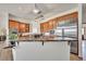 Spacious kitchen featuring stainless steel appliances, custom cabinets, and granite countertops at 15125 Spring Valley Rd, Larkspur, CO 80118