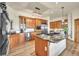 Gourmet kitchen with granite countertops, stainless steel appliances, and custom cabinetry at 15125 Spring Valley Rd, Larkspur, CO 80118