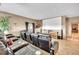 Living room with tiered seating, large projection screen, and windows with dark curtains for light control at 15125 Spring Valley Rd, Larkspur, CO 80118