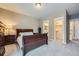 Well-lit bedroom with an ensuite bathroom and walk-in closet at 5835 Pelican Shores Dr, Longmont, CO 80504