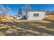 Spacious backyard with a patio and outdoor seating, perfect for relaxing and entertaining at 8985 Lander St, Westminster, CO 80031