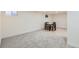 Finished basement area with new carpet and light hardwood floors, offering a versatile space at 8985 Lander St, Westminster, CO 80031