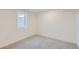 Bright, carpeted bedroom with a window, offering a serene and comfortable space at 8985 Lander St, Westminster, CO 80031