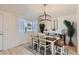 Bright dining area with a view to the living room, perfect for entertaining guests at 8985 Lander St, Westminster, CO 80031
