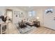 Cozy living room with neutral tones, stylish decor, and ample natural light at 8985 Lander St, Westminster, CO 80031