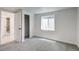 A comfortable bedroom with a closet and a window for plenty of natural light at 4818 Bryant St, Denver, CO 80221