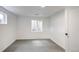 A bright bedroom with a window, perfect for relaxation or sleep at 4818 Bryant St, Denver, CO 80221