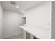 Clean and bright hallway with a countertop and sink at 4818 Bryant St, Denver, CO 80221