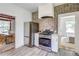 Open-concept kitchen with stainless steel appliances, and an eat-in dining area at 4818 Bryant St, Denver, CO 80221