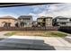 View of backyard with fence overlooking other houses in the neighborhood at 27615 E Archer Ave, Aurora, CO 80018
