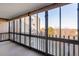 Bright sunroom with expansive views and window coverings at 14390 E Marina Dr # 510, Aurora, CO 80014