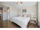 Bedroom with hardwood floors, vaulted ceiling and two windows at 3035 S Indiana St, Lakewood, CO 80228