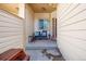 Inviting front porch with chairs, table and decor at 3035 S Indiana St, Lakewood, CO 80228