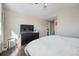 Bright main bedroom with a walk-in closet and neutral colors to complement any decor at 3035 S Indiana St, Lakewood, CO 80228