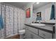 Bathroom with a shower, modern vanity, and functional design, providing a clean and comfortable space at 1143 Hummingbird Cir, Longmont, CO 80501