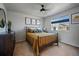 Inviting bedroom with a comfortable bed, ample natural light, and modern decor for a relaxing atmosphere at 1143 Hummingbird Cir, Longmont, CO 80501
