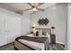 Bright bedroom with a queen bed and plenty of closet space at 277 N Broadway # 208, Denver, CO 80203
