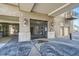 Modern condo building entrance with glass doors at 277 N Broadway # 208, Denver, CO 80203