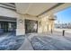 Modern condo building entrance with glass doors at 277 N Broadway # 208, Denver, CO 80203
