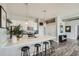 Contemporary kitchen boasting white cabinets and stainless steel appliances at 277 N Broadway # 208, Denver, CO 80203