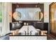 Modern bathroom featuring a large soaking tub, dual vanities, and sleek design at 235 Eudora St, Denver, CO 80220