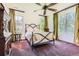 Bedroom with large windows and neutral carpet, providing natural light and a bright airy feel at 235 Eudora St, Denver, CO 80220