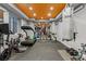 Well-equipped home gym with modern exercise equipment and mirrors for a complete workout experience at 235 Eudora St, Denver, CO 80220