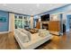 Bright living room with fireplace and hardwood floors at 235 Eudora St, Denver, CO 80220