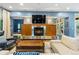 Bright living room with fireplace and built-in cabinetry at 235 Eudora St, Denver, CO 80220