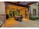 Outdoor patio with stone floors and dining table at 235 Eudora St, Denver, CO 80220