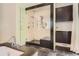 Luxurious walk-in shower with multiple shower heads and custom tile work at 235 Eudora St, Denver, CO 80220