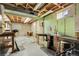 Unfinished basement featuring exposed ceiling and painted walls at 4108 S Inca St, Englewood, CO 80110