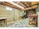 Unfinished basement featuring exposed ceiling and painted walls at 4108 S Inca St, Englewood, CO 80110