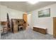 Comfortable bedroom with an antique wooden desk and a light neutral wall color at 4108 S Inca St, Englewood, CO 80110
