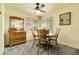Bright dining area with carpet flooring and classic wood furniture at 4108 S Inca St, Englewood, CO 80110